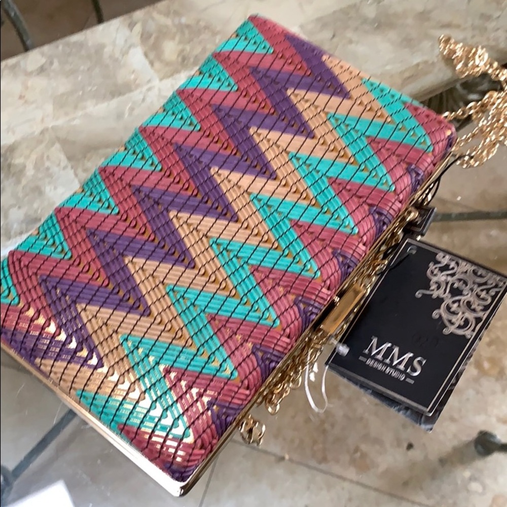 Beautiful clutch two sided with gold chain8x5